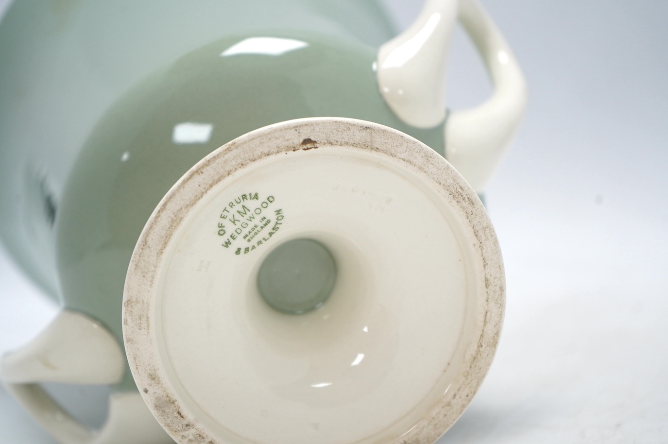 Keith Murray, a Wedgwood celadon glazed two handled vase, 25.5cm. Condition - good
